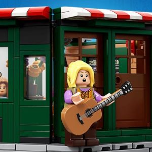Colorful Lego café scene with live music and characters enjoying coffee and conversation.