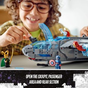 Child joyfully builds a colorful futuristic LEGO spaceship, sparking creativity and imagination through play.