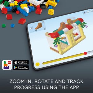 Colorful LEGO bricks and a tablet show a vibrant concession stand build for creative play.