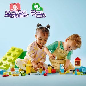 Children joyfully build with colorful blocks, enhancing creativity and fine motor skills through play.