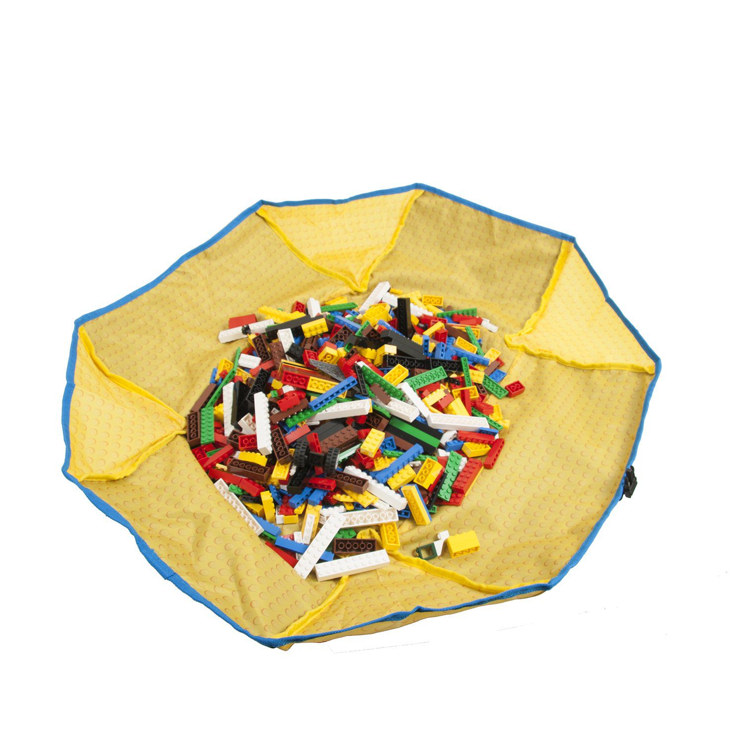 Colorful building blocks on a circular mesh play mat, inspiring creativity in young builders.
