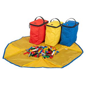 Colorful play mat with storage bags and building blocks, encouraging imaginative play and organization.