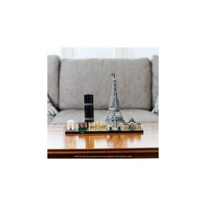 Charming Lego Eiffel Tower model set amidst detailed European buildings and an industrial smokestack.