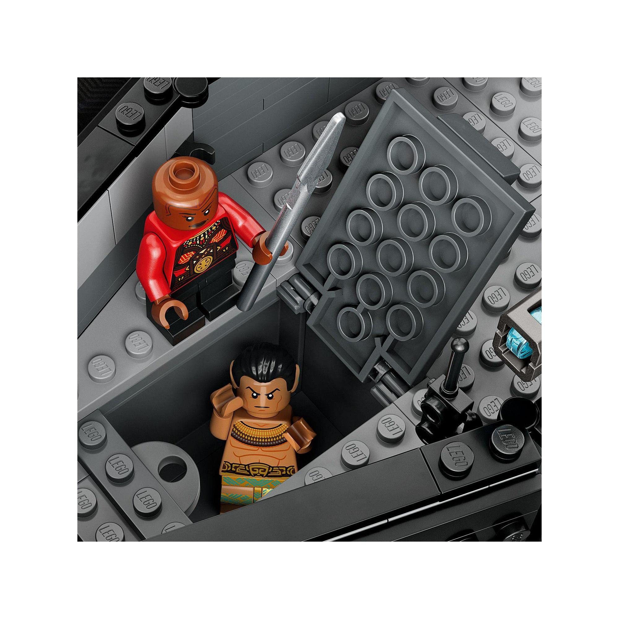 Dynamic LEGO spacecraft scene showcasing a tense power struggle between two contrasting characters.