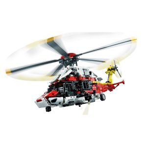 Vibrant LEGO helicopter model with spinning rotors and mini figure for imaginative play.