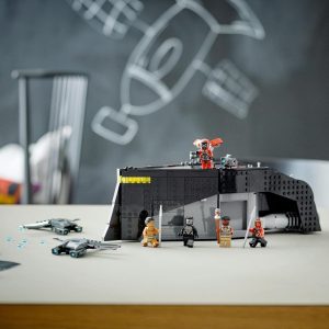 Dynamic LEGO fort scene with minifigures, rockets, and creative play elements.