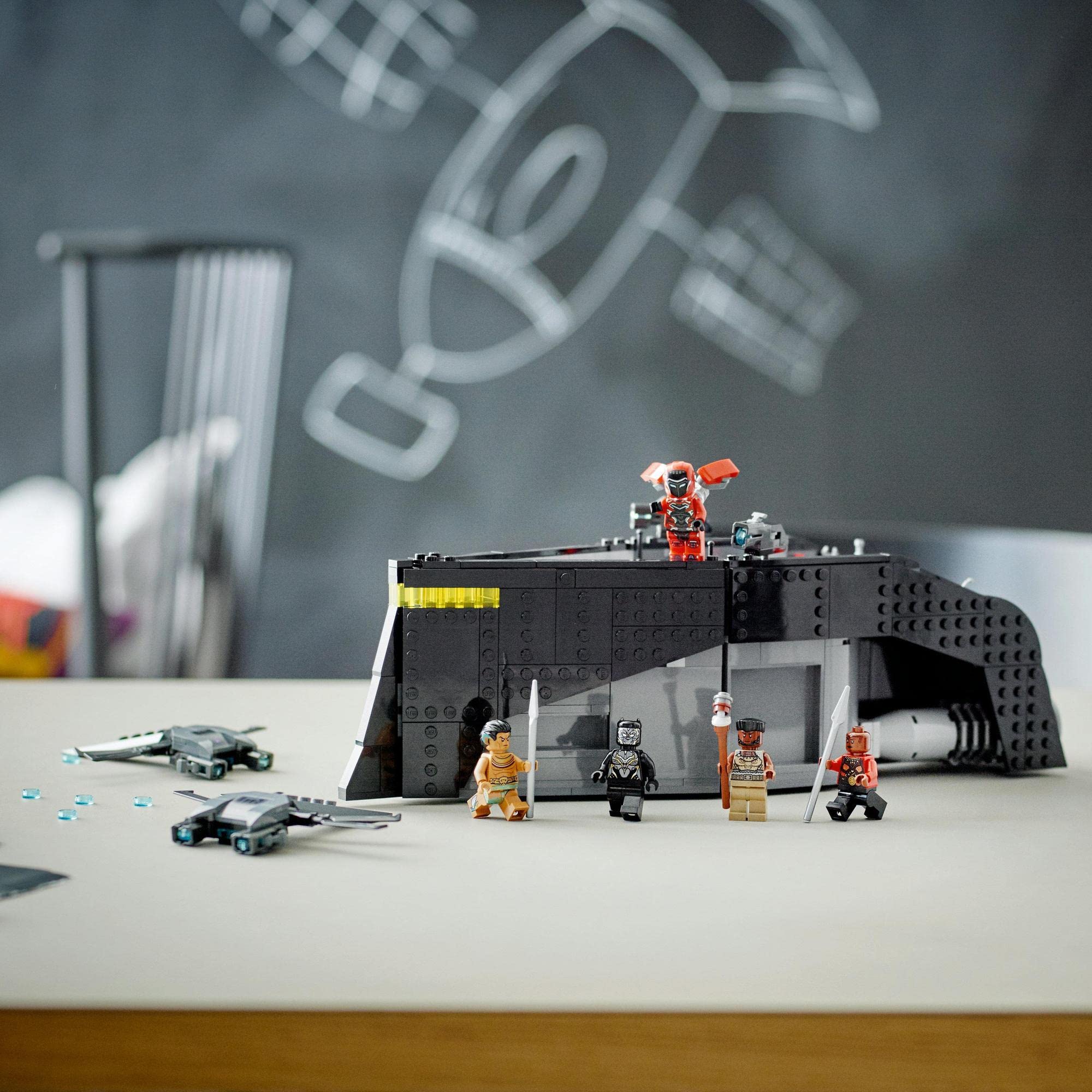 Dynamic LEGO fort scene with minifigures, rockets, and creative play elements.