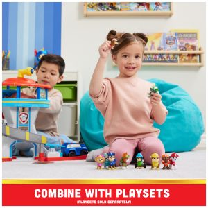 Kids joyfully engage in imaginative play with colorful action figures in a vibrant playroom.