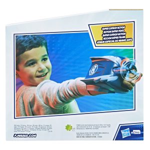 Boy joyfully plays with colorful toy blaster in a bright, imaginative setting.
