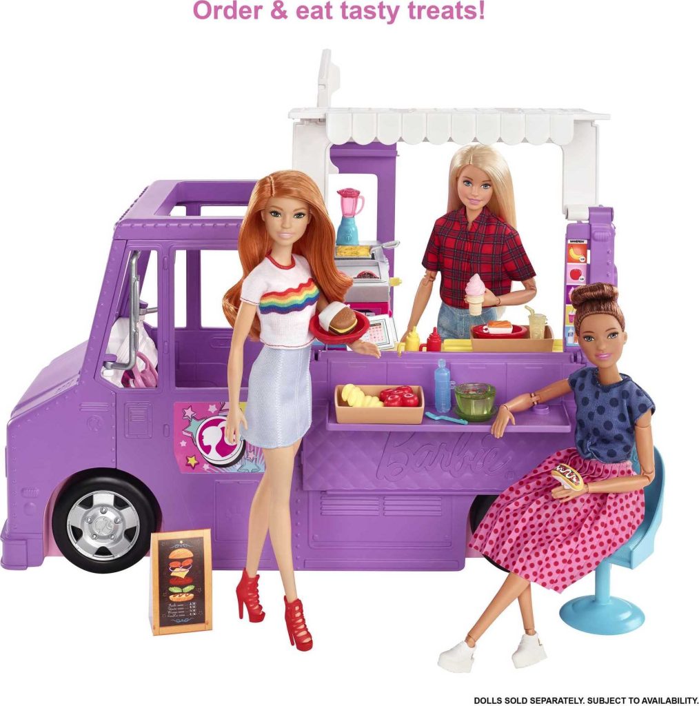 Playful food truck playset featuring dolls serving treats in a vibrant, imaginative setting.