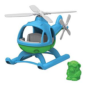 Blue toy helicopter with green accents and playful dog figure for imaginative childrens play.