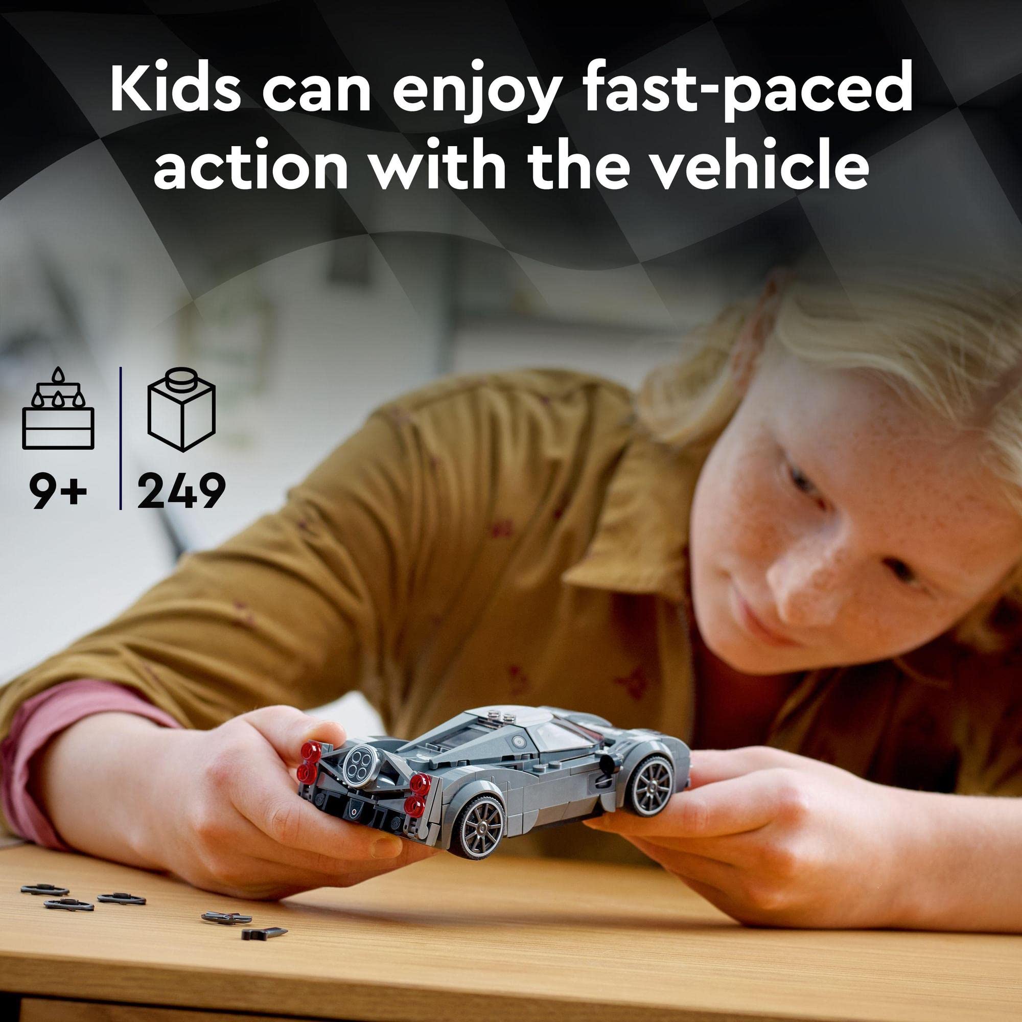 Child focused on building a 249-piece car model in a creative play environment.