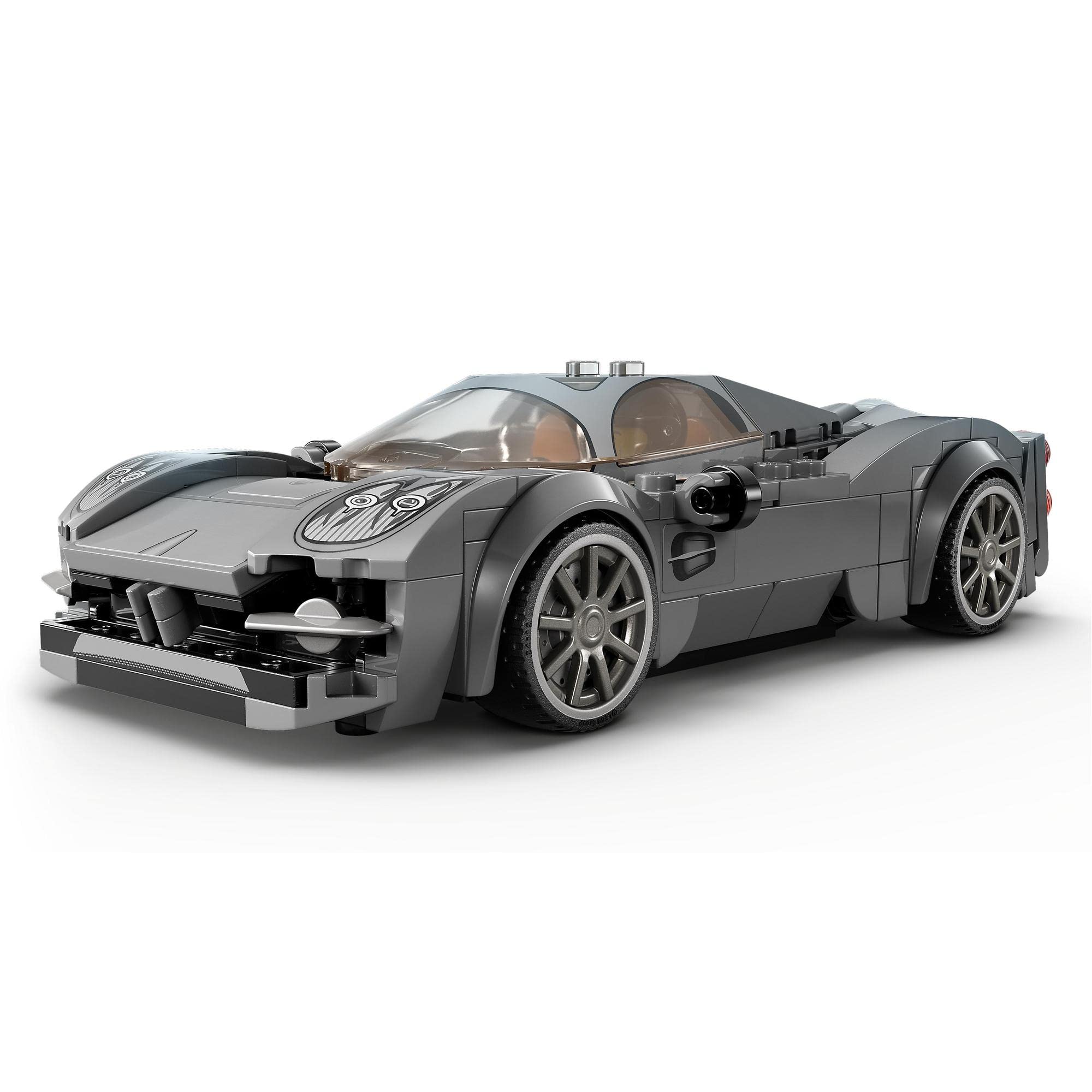 Glossy gray sports car model made from building blocks, featuring realistic details and sleek design.