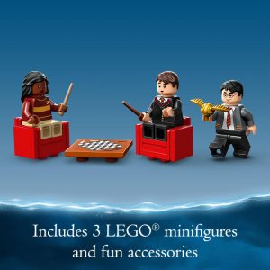 Magical LEGO celebration scene with vibrant minifigures, colorful chairs, and a game board.