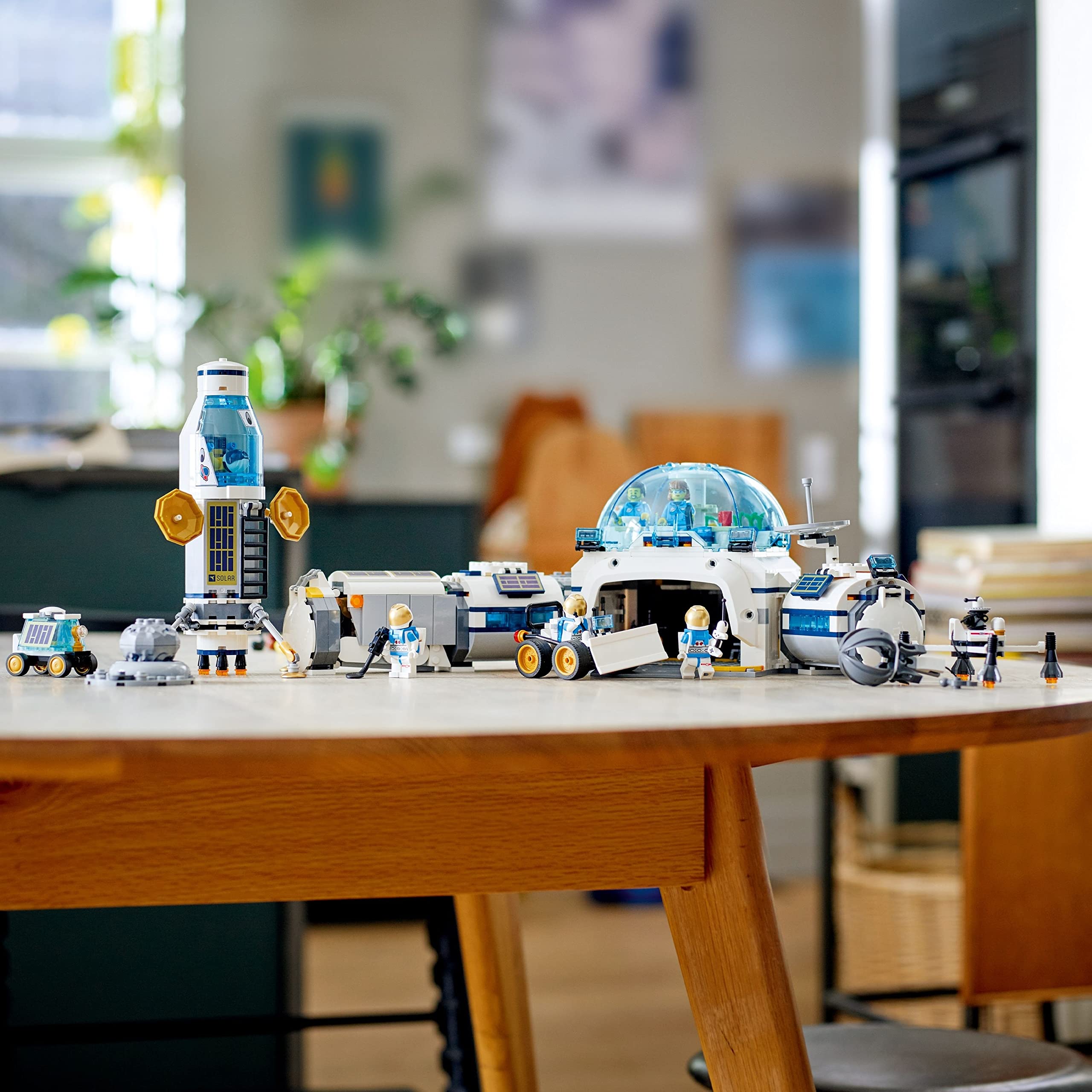 Vibrant LEGO space set featuring astronauts, vehicles, and structures in a creative play environment.