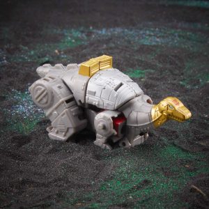 Intricately designed robotic dinosaur toy in gray with gold accents, perfect for imaginative play.