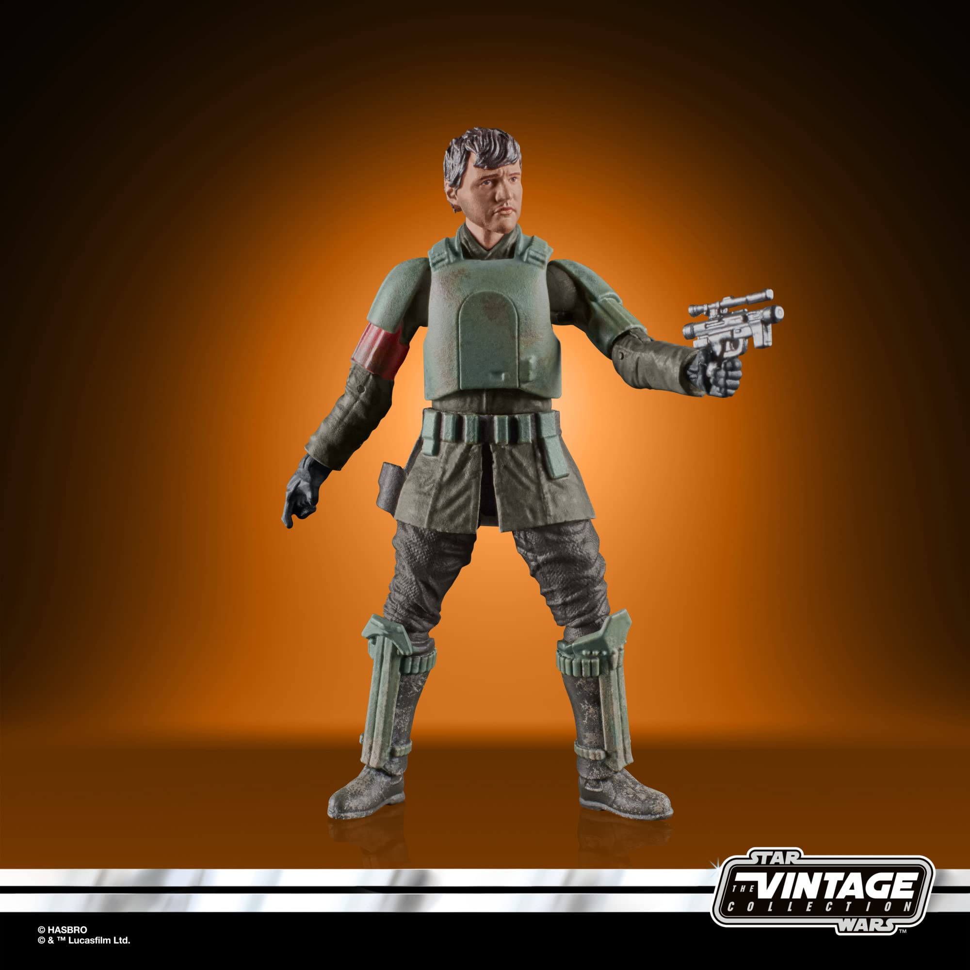 Dynamic Star Wars Vintage Collection action figure with blaster, featuring detailed rugged attire.