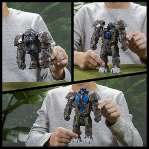 Child joyfully plays with gray and blue robot toys in a vibrant outdoor setting.