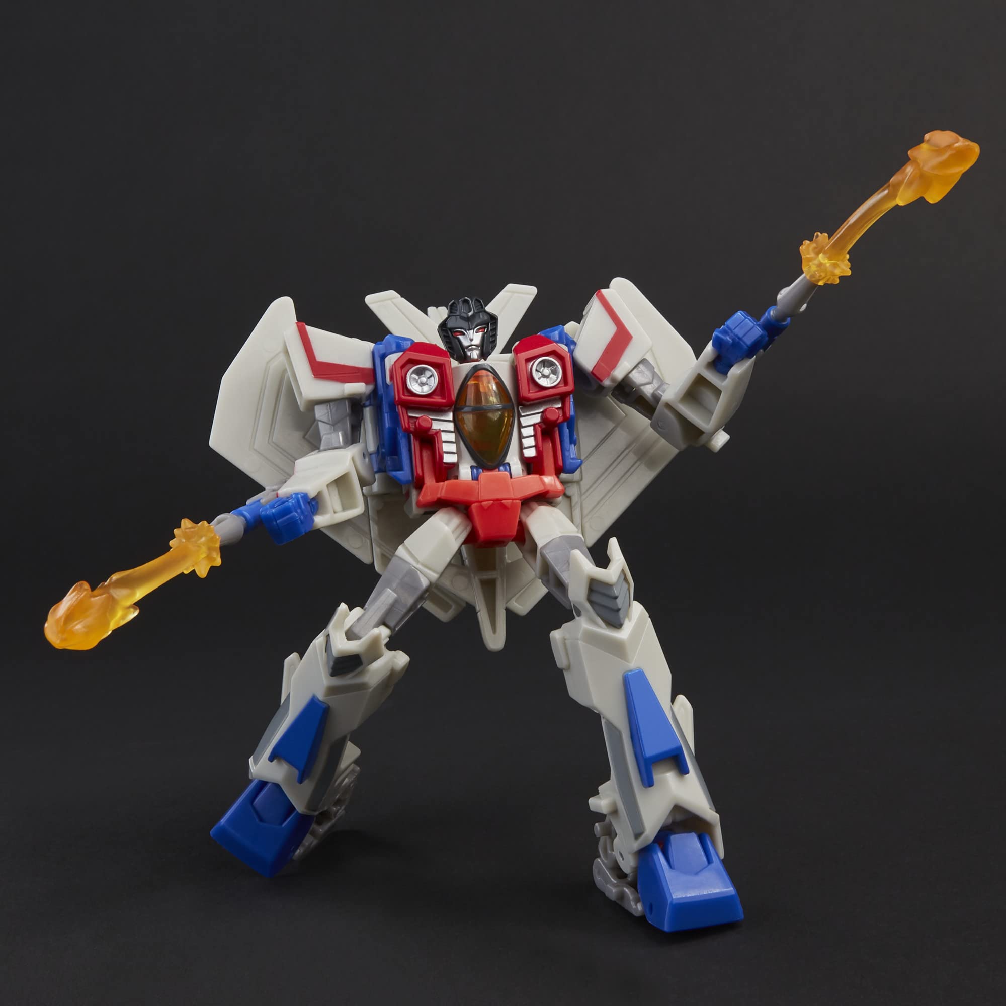 Vibrant mech robot action figure in dynamic pose with flame projectiles against black backdrop.