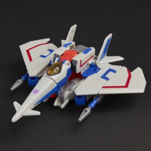 Sleek futuristic fighter jet model in white with blue and red accents, built for speed.