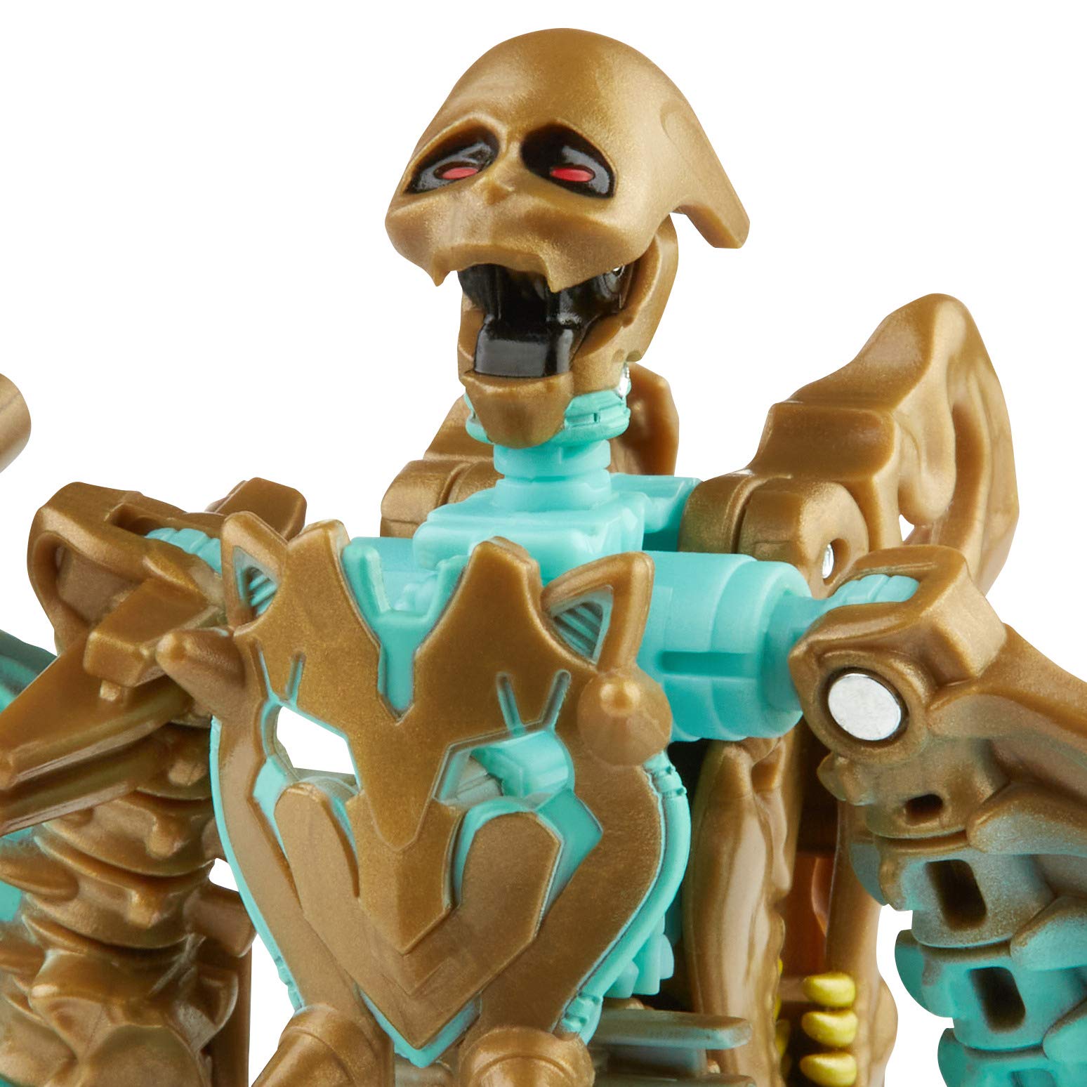 Golden skeletal robot toy with articulated joints, red eyes, and vibrant turquoise accents.