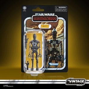 IG-11 action figure from The Mandalorian, vintage packaging, includes blaster rifle, vibrant design.