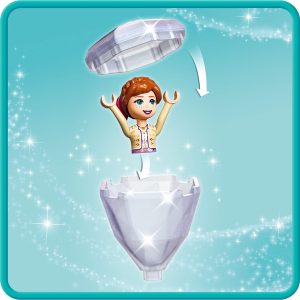 Joyful character bursts from a sparkling gem, radiating playfulness and imagination against a turquoise backdrop.