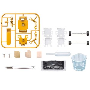 Bright yellow model kit sprue with parts, wheels, and tools for creative assembly.