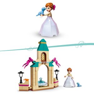 Princess in pink gown with blue creature in a charming LEGO garden scene.