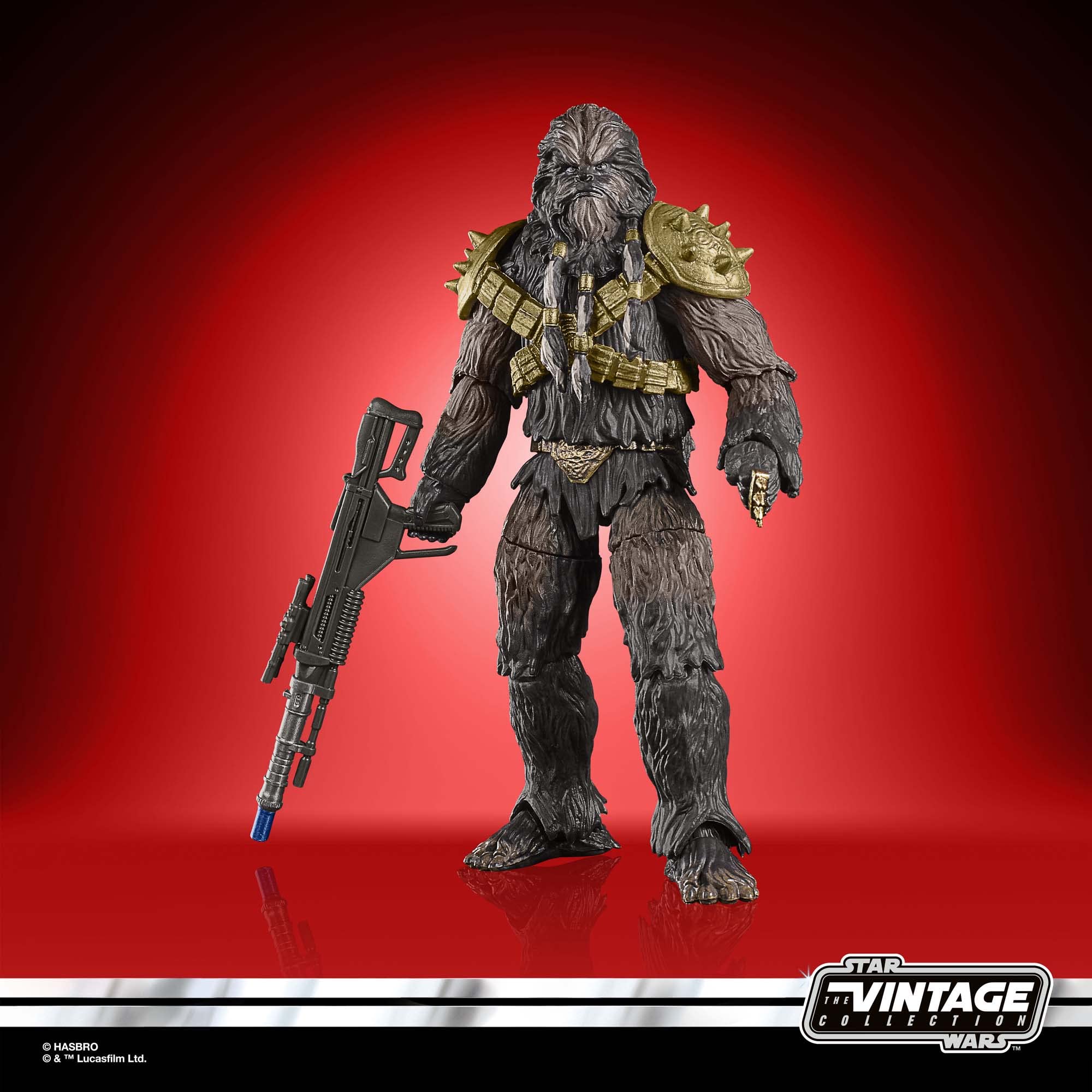 Star Wars shaggy warrior action figure with blaster, detailed armor, and dramatic red backdrop.