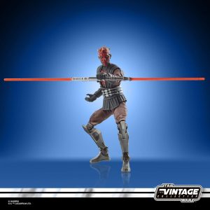Star Wars Vintage Sith Warrior Action Figure with red lightsaber, perfect for collectors.