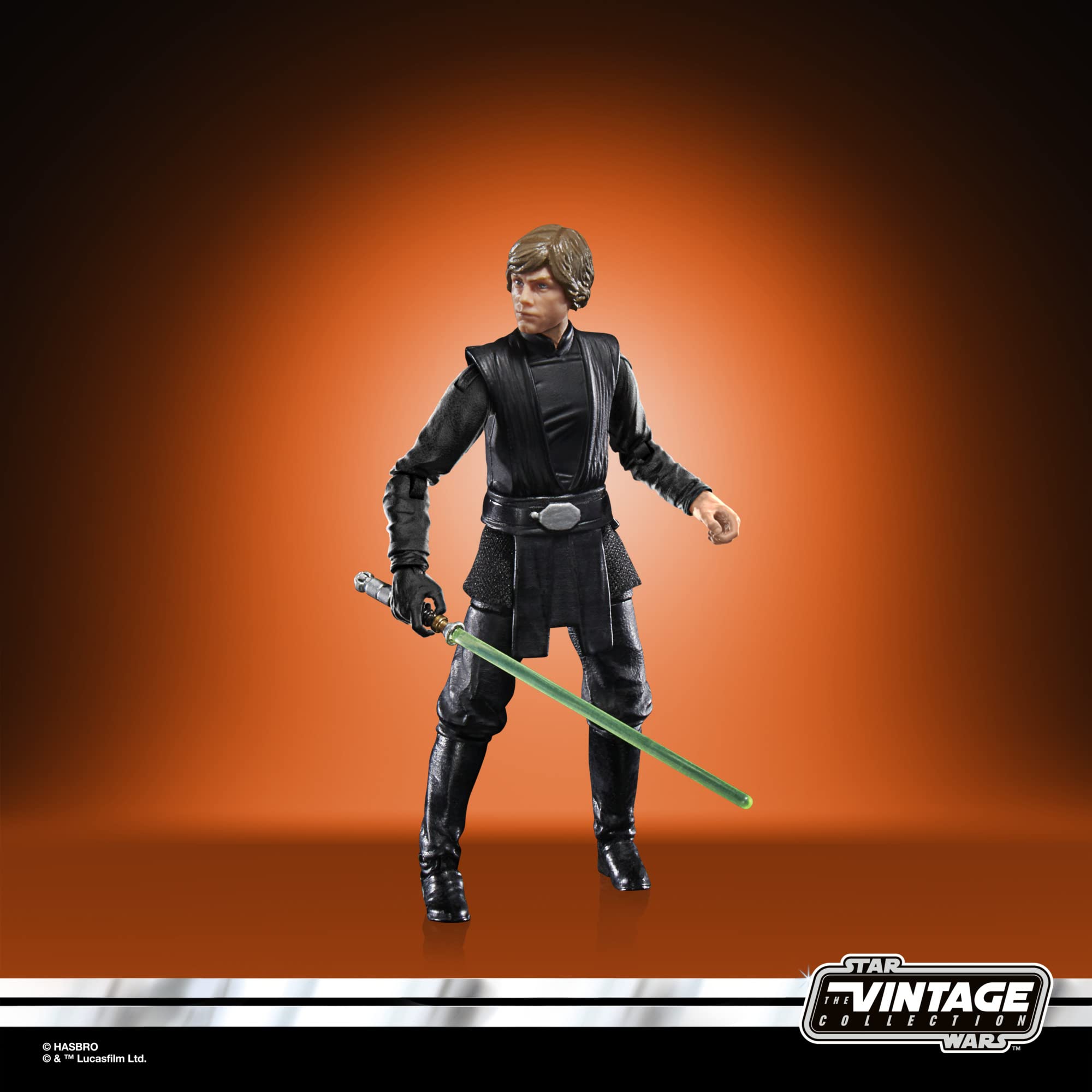 Dynamic Luke Skywalker action figure with lightsaber against vibrant orange backdrop. Vintage Star Wars collectible.