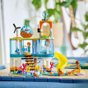 Colorful underwater adventure playset with waterslide, lookout, and engaging miniature figures.