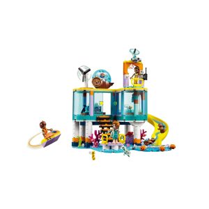 Colorful underwater playset with slides, coral, and adventurous characters for imaginative play.
