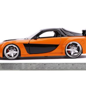 Vibrant orange and black sports car model with sleek design and detailed wheels.