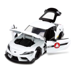 Sleek white Toyota Supra model with open doors, showcasing detailed interior and engine craftsmanship.