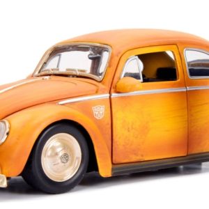 Vintage orange car and stylish woman ready for adventure, blending nostalgia and modern charm.