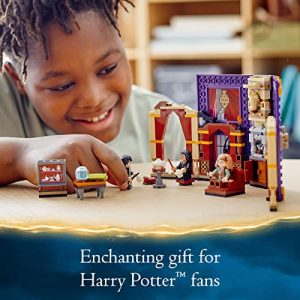 Joyful boy plays with colorful Harry Potter building set, sparking creativity and magical adventure.