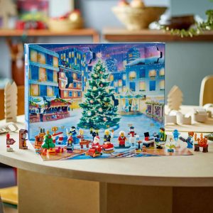 Festive LEGO Advent calendar with colorful figures in a charming holiday village scene.