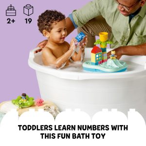 Joyful toddler bath time with colorful educational number toys and engaged caregiver.