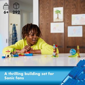 Child happily builds with a colorful Sonic LEGO set in a bright, inviting playroom.