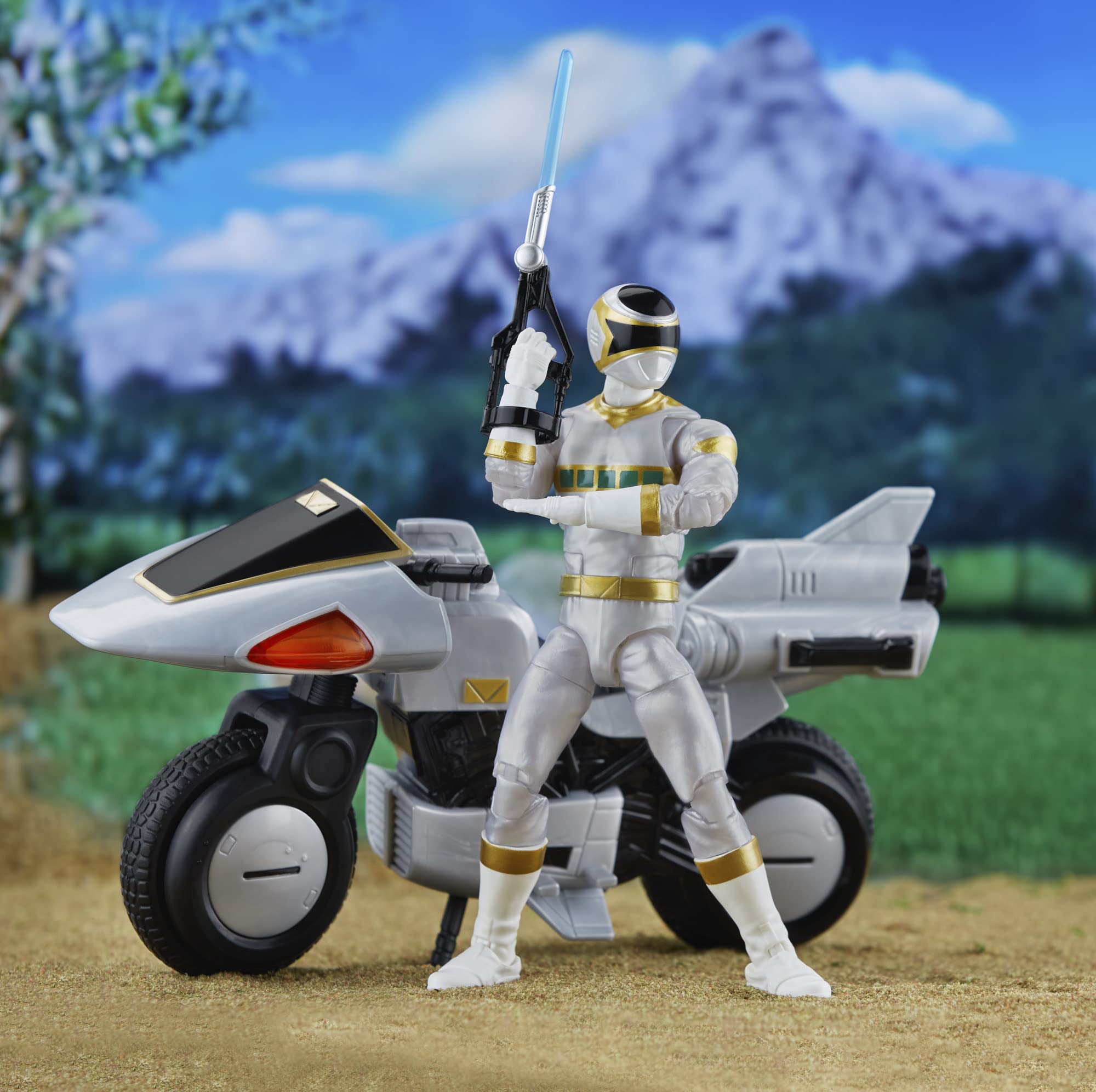 Futuristic hero with lightsaber beside advanced motorcycle in a vibrant mountain landscape.
