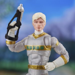 Futuristic action figure with blaster, exuding confidence in a dynamic alien landscape.