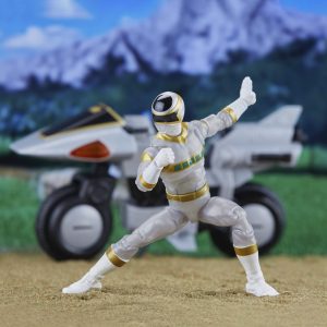 Futuristic white-suited hero action figure with vehicle, set against a vibrant adventure landscape.