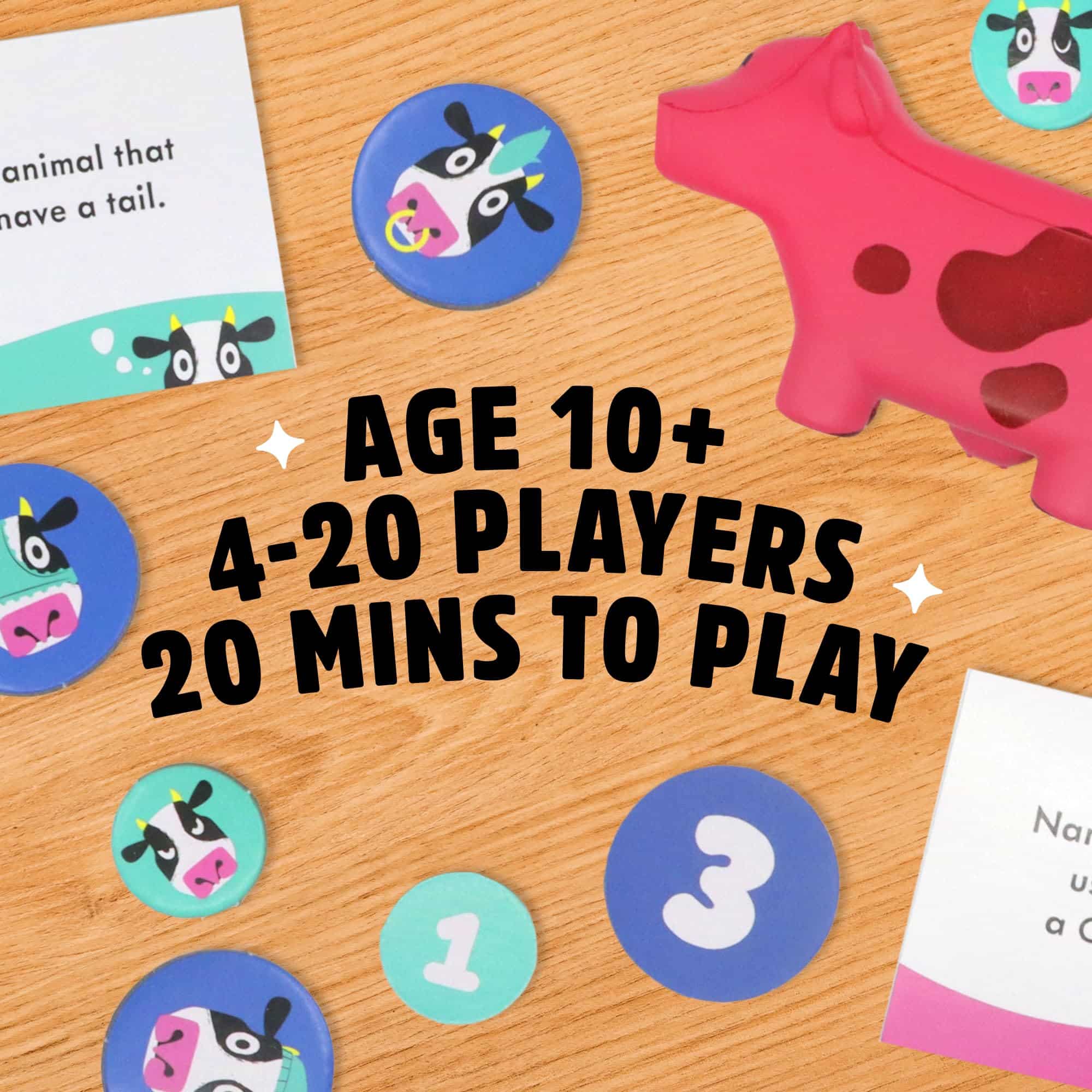 Colorful animal game featuring a pink cow and interactive tokens for family fun.