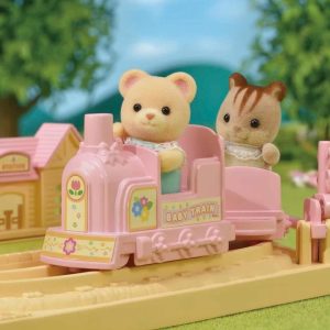 Whimsical pink toy train with bear and chipmunk in a vibrant, adventurous landscape.