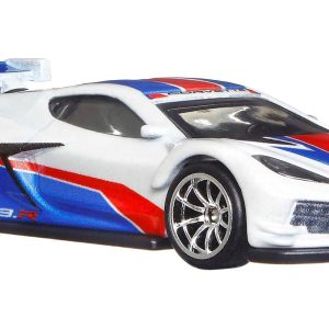 Sleek white sports car model with red and blue racing stripes, showcasing aerodynamic design and details.