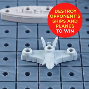 Strategic board game featuring air and naval combat with fighter jet and ship models.
