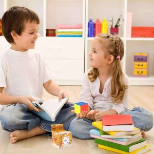 Children exploring creativity and learning together in a bright, inviting playroom.