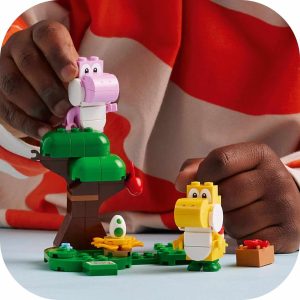 Playful dinosaurs explore a colorful block world, igniting creativity and imagination in children.